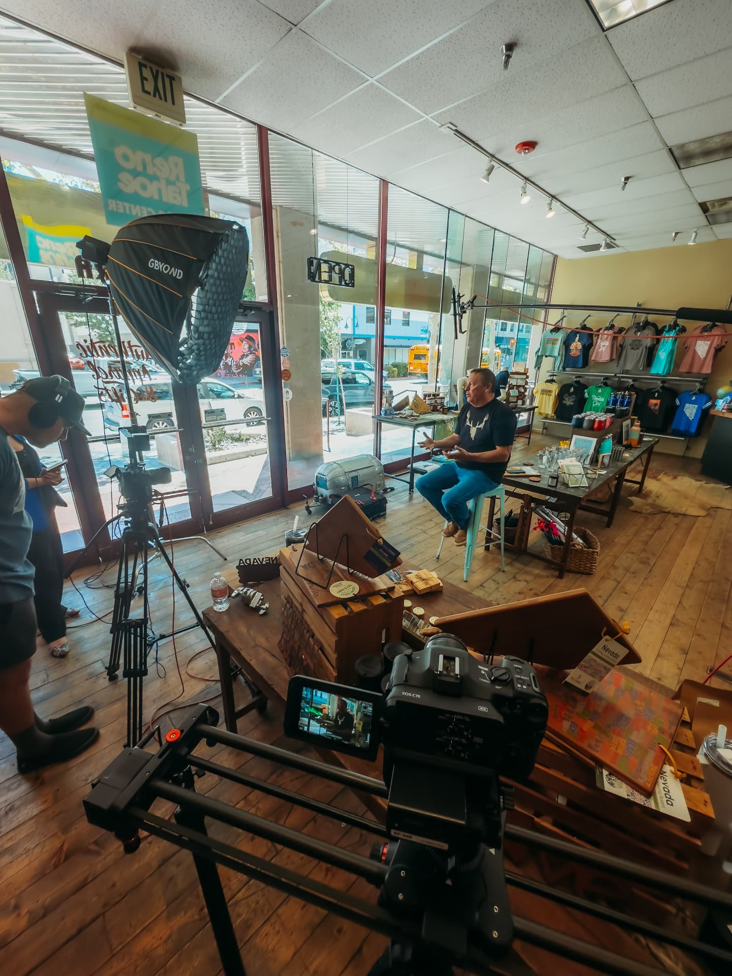 Filming a client in their retail shop